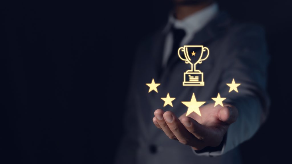 Customer or businessman hand holding 5 stars with copy space, rating service, satisfaction concept